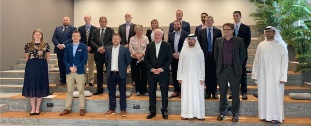 Katie Miller, Derek Harris, and Alan Thompson in Dubai at the 72nd International Astronautical Conference, the World Space Day Expo 2021